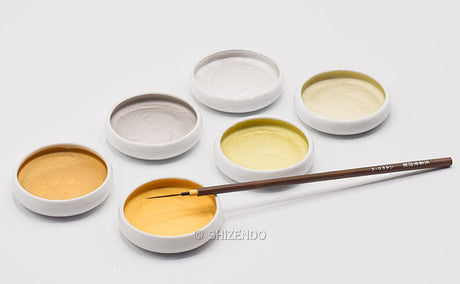 An image of collections of genuine gold powder for art and craft.